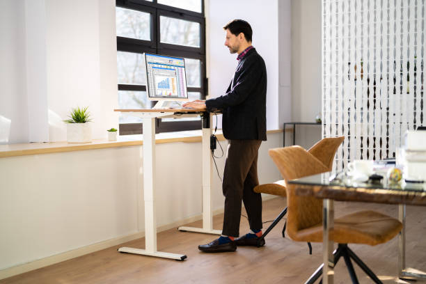 Sit and Stand Desk Malta in use at work