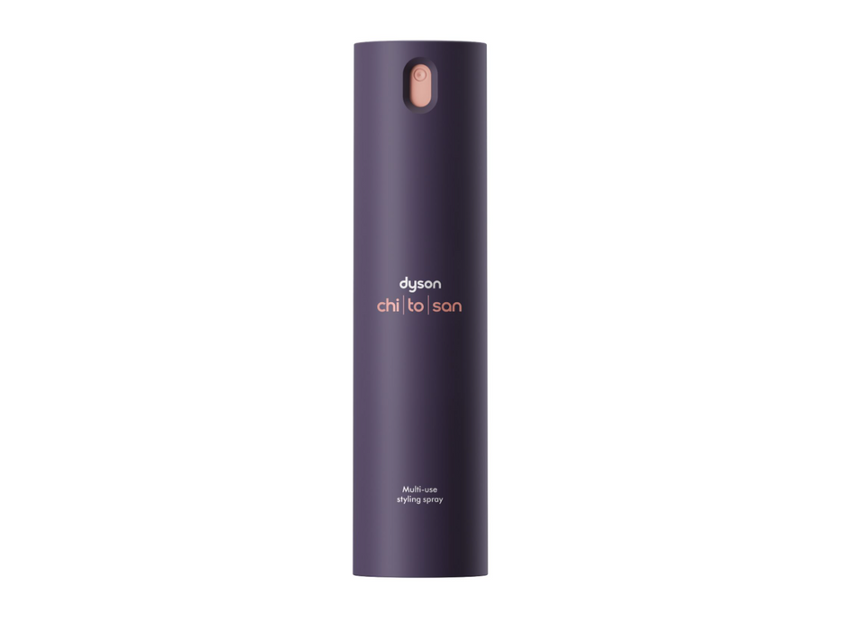 A tall, cylindrical Dyson Chi To Ion hair styling spray bottle in a dark purple color, shown against a plain white background.