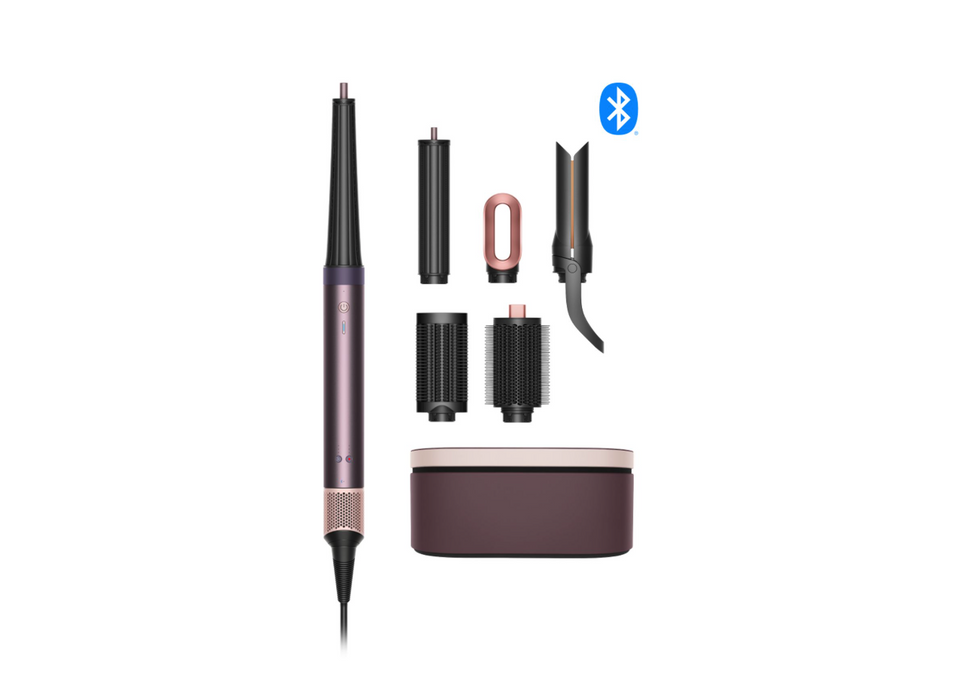A hair styling tool set on a white background, featuring a main wand, several interchangeable attachments, a charging case, and a blue Bluetooth icon.