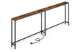 A long industrial console table with a rustic brown wood top and a black metal frame, featuring an integrated power outlet on the tabletop and a coiled power cord on the floor, shown on a white background.