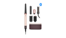 A hair styling tool set on a white background, featuring a rose gold and black wand-style device, several interchangeable attachments, a dark brown charging case, and a small blue Bluetooth symbol.