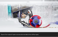 Technical promotional rendering of a Dyson floor cleaner showing the internal Twin-capture system in action, with dust and debris being captured by a red, blue, and white circular filter wheel and shown as particles being trapped inside transparent-looking chambers. A black text bar at the bottom reads: 'Dyson's Twin-capture system removes dust and debris from all floor types.