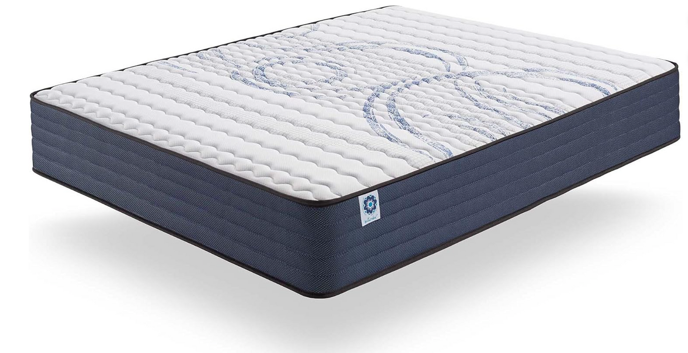 A mattress shown at an angle on a clean white background, featuring a white quilted top with blue wave-like patterns and a dark navy blue side. Winter Side