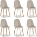 beige set of dining chairs